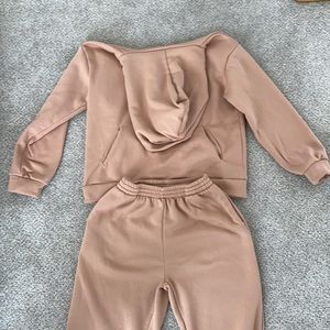 Light brown sweatsuit. Medium